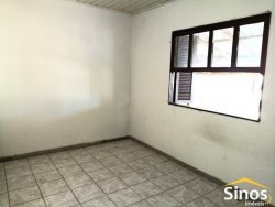 Casa com 03 dormitórios para locação no bairro Scharlau 