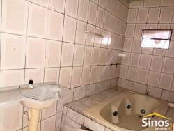 Casa com 03 dormitórios para locação no bairro Scharlau 