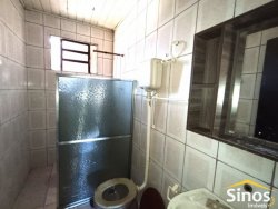 Casa com 03 dormitórios para locação no bairro Scharlau 