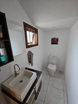Terreno com 03 casas com 03 dormitórios no Bairro Rio Branco 
