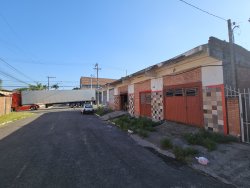 Terreno com prédio comercial e residencial no bairro Ideal 