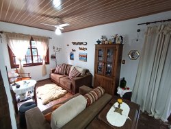Casa com 03 dormitórios e terreno com 900m² no bairro Costa do Morro 