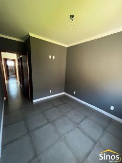 Casa com 03 dormitórios no bairro Jardim das Acácias 