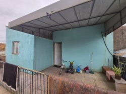 Pavilhão com casas no bairro Canudos 
