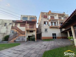 Terreno de esquina com 1.900m² com construção no bairro Ouro Branco 