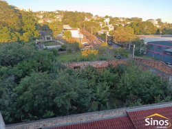 Terreno de esquina com 1.900m² com construção no bairro Ouro Branco 