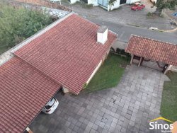 Terreno de esquina com 1.900m² com construção no bairro Ouro Branco 