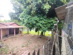 Terreno com 1.539m² com construção no bairro Rondônia 
