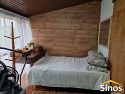 Casa em estilo rústico com 03 dormitórios para locação 