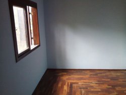 Terreno de esquina com dois imoveis 