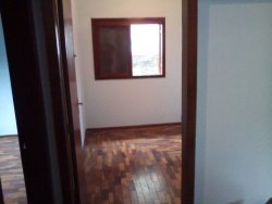 Terreno de esquina com dois imoveis 