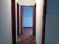 Terreno de esquina com dois imoveis 
