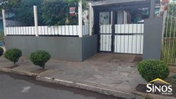 Terreno com 02 Imóveis na Scharlau 