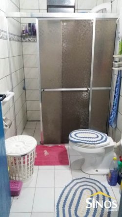 Terreno com 02 Imóveis na Scharlau 