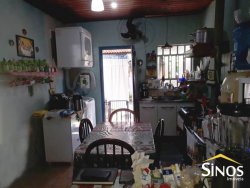 Terreno com 02 Imóveis na Scharlau 