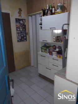 Terreno com 02 Imóveis na Scharlau 