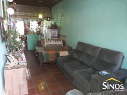 Terreno com 02 Imóveis na Scharlau 