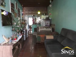Terreno com 02 Imóveis na Scharlau 