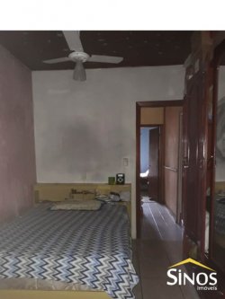 Terreno com 02 Imóveis na Scharlau 