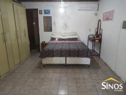 Terreno com 02 Imóveis na Scharlau 
