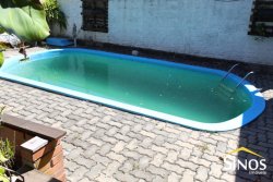Casa com 02 dormitórios e piscina 