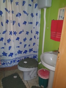 Terreno com duas casas no Passo dos Corvos  