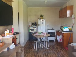 Terreno com duas casas no Passo dos Corvos  