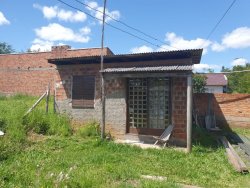 Terreno com duas casas no Passo dos Corvos  