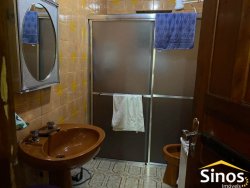 Casa com três dormitórios de 160 m² 