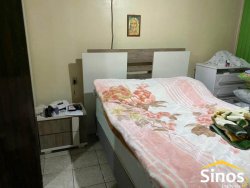 Casa com três dormitórios de 160 m² 