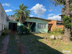 Casa com três dormitórios de 160 m² 
