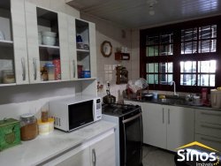 Sobrado em ótima localização, com quatro dormitórios 