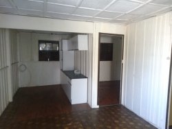 Terreno com 02 casas no Ideal 