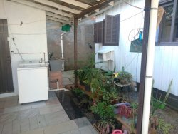 Terreno com 02 casas no Ideal 