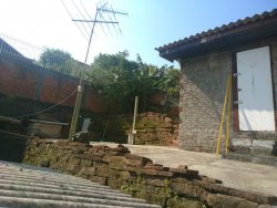 Terreno com 02 casas no Ideal 