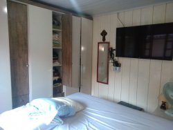 Terreno com 02 casas no Ideal 