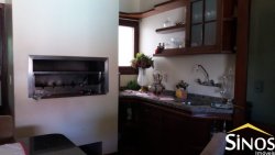 Casa com prédio comercial no Bairro Santo Afonso 