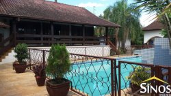 Casa com prédio comercial no Bairro Santo Afonso 