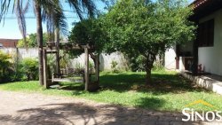 Casa com prédio comercial no Bairro Santo Afonso 