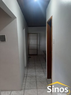 Sobrado com sala comercial no bairro Santo Afonso 