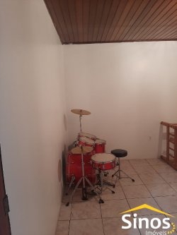 Sobrado com sala comercial no bairro Santo Afonso 