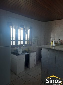 Sobrado com sala comercial no bairro Santo Afonso 