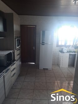 Sobrado com sala comercial no bairro Santo Afonso 