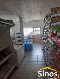 Sobrado com sala comercial no bairro Santo Afonso 