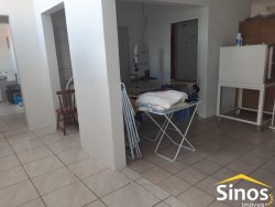 Sobrado com sala comercial no bairro Santo Afonso 
