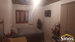 Sobrado com sala comercial no bairro Santo Afonso 