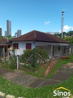 Terreno com chalé no bairro Jardim Mauá 
