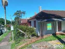 Terreno com chalé no bairro Jardim Mauá 