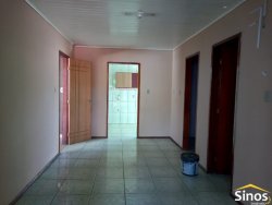 Terreno com 02 casas no bairro Rondônia 