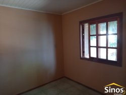 Terreno com 02 casas no bairro Rondônia 